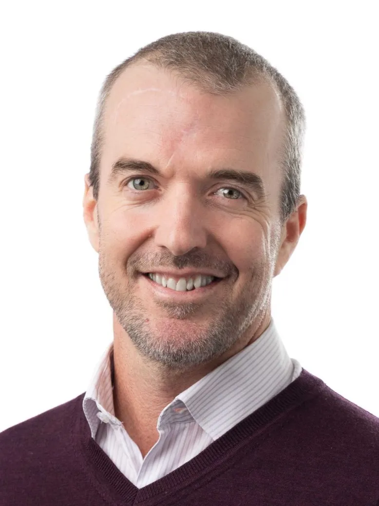 Headshot of Andrew Jones.